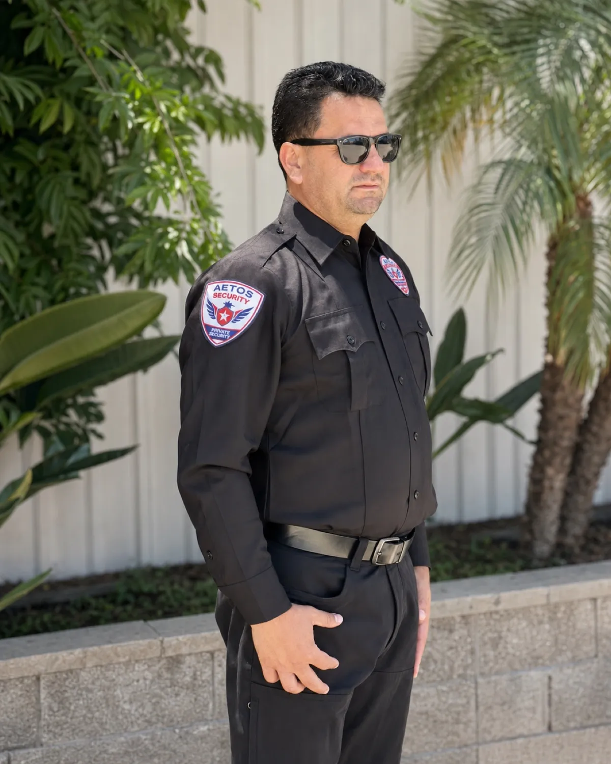 Aetos Security officer on mobile patrol duty